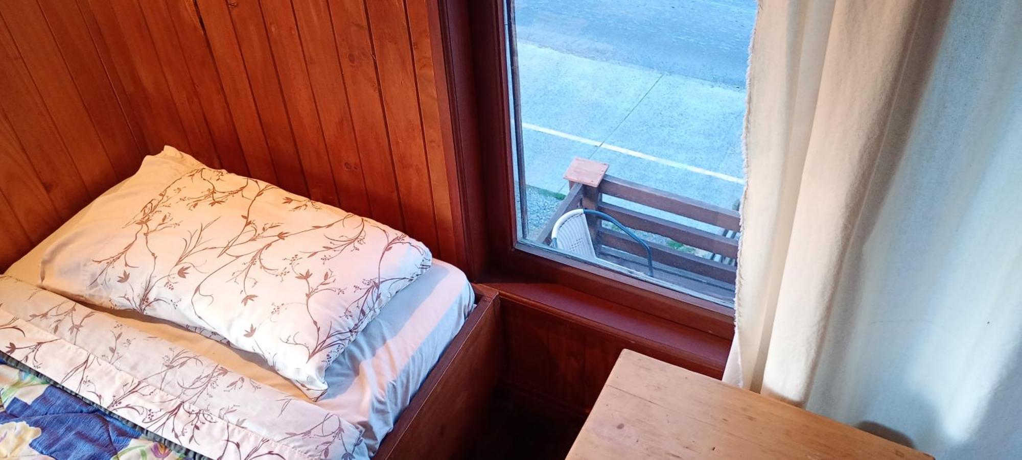 Hostal Quillelhue Пукон Номер фото